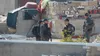 Four armed Israeli officers standing between Palestinian homes in Khallet Athaba