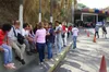 Relatives of prisoners wait outside El Helicoide in Caracas