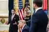 Todd Blanche speaks in the Oval Office as Donald Trump sits in front of him