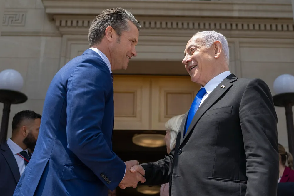Pete Hegseth shakes hands with Benjamin Netanyahu at the Pentagon